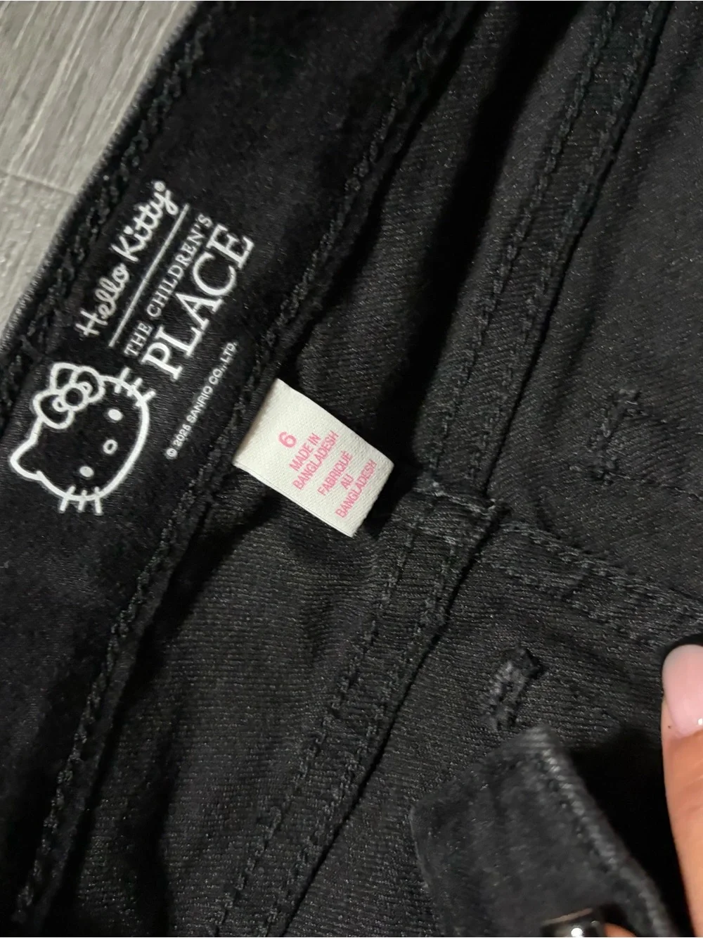 Hello Kitty Black Jeans with Pink Embroidered Hello Kitty Faces